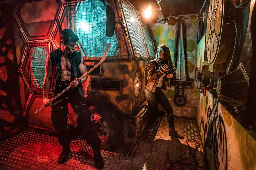 Team constructing an interactive escape-room mechanism